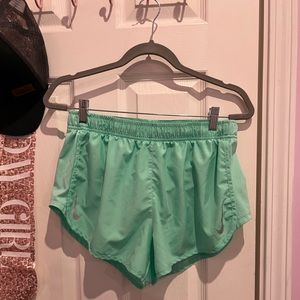 Nike DRI-FIT. Great condition other than the mark as posted